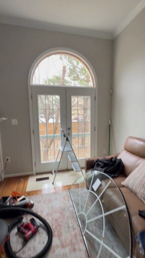 Repairing the glass in an arched French door